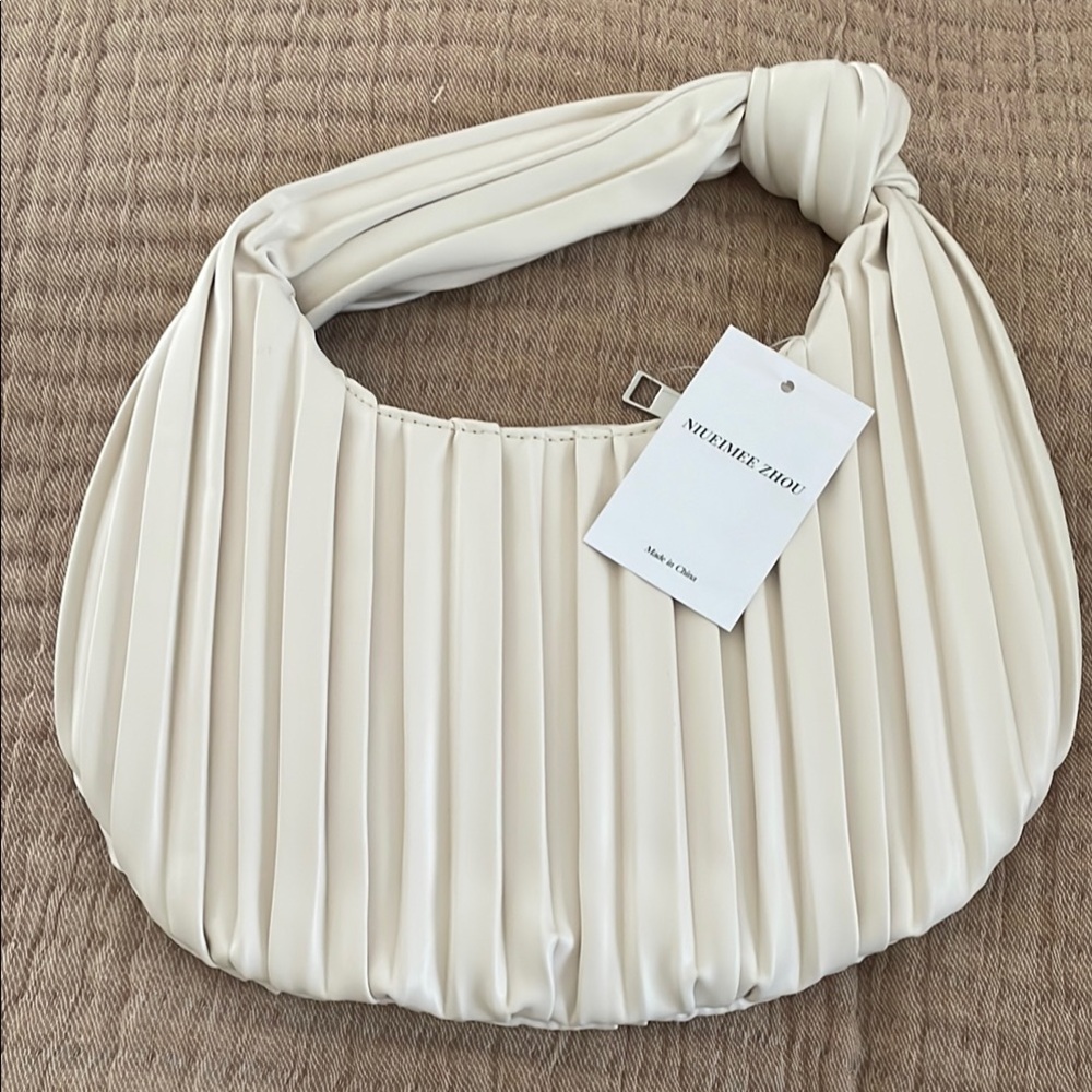Cream Textured Pleated Convertible Knotted Handbag